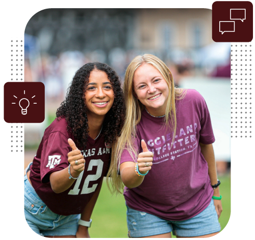 Two female students giving a thumbs-up at a football tailgate.