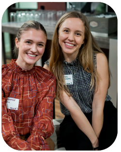 Two retail students at a networking event.