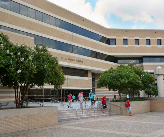 Students walking in front of Wehner building.