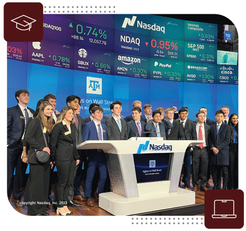 Group of students smiling at the Nasdaq Headquarters.