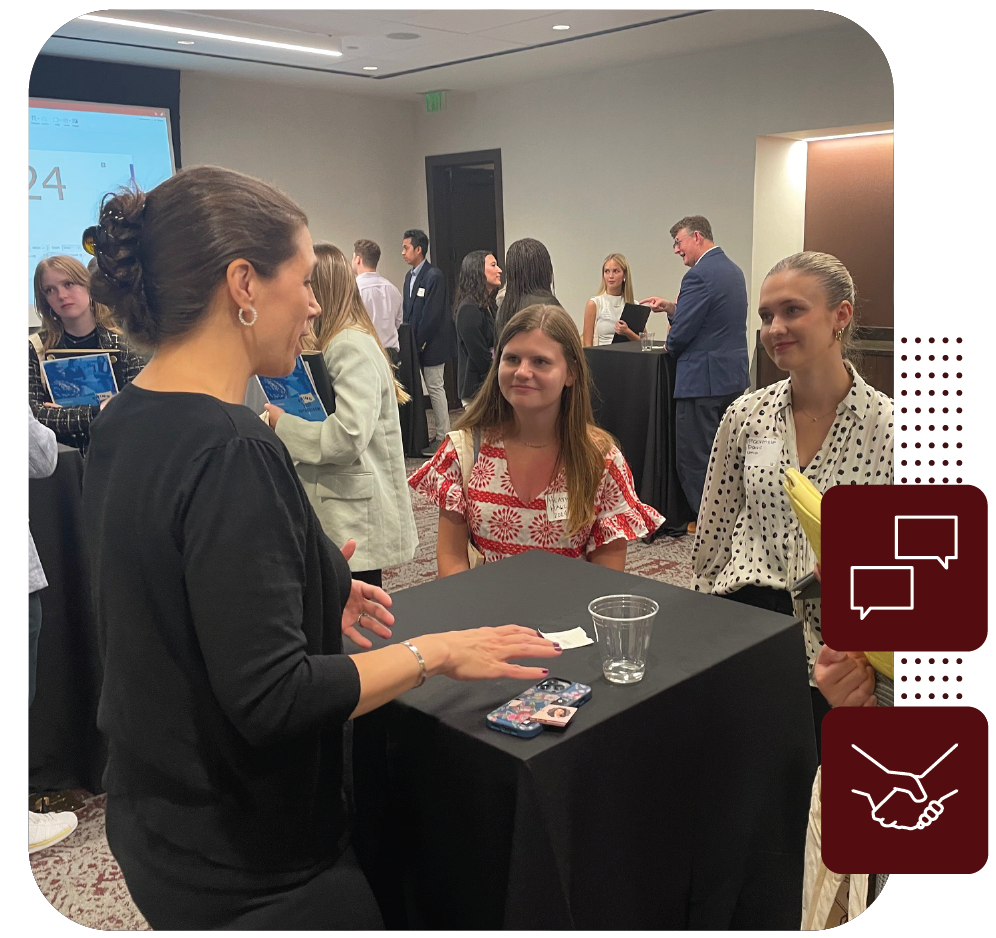 Students at a Speed Networking Event, talking to a company representative.