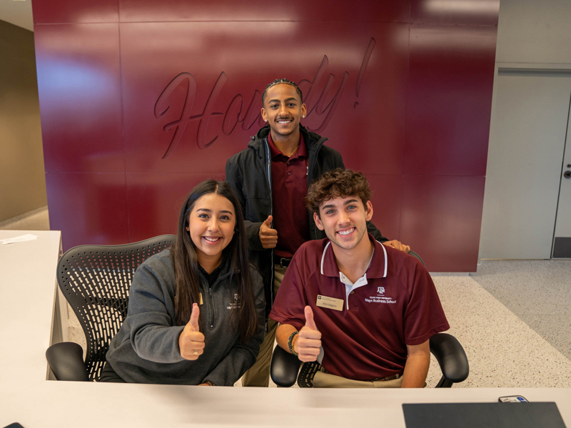 Students pose in front of Wehner building.