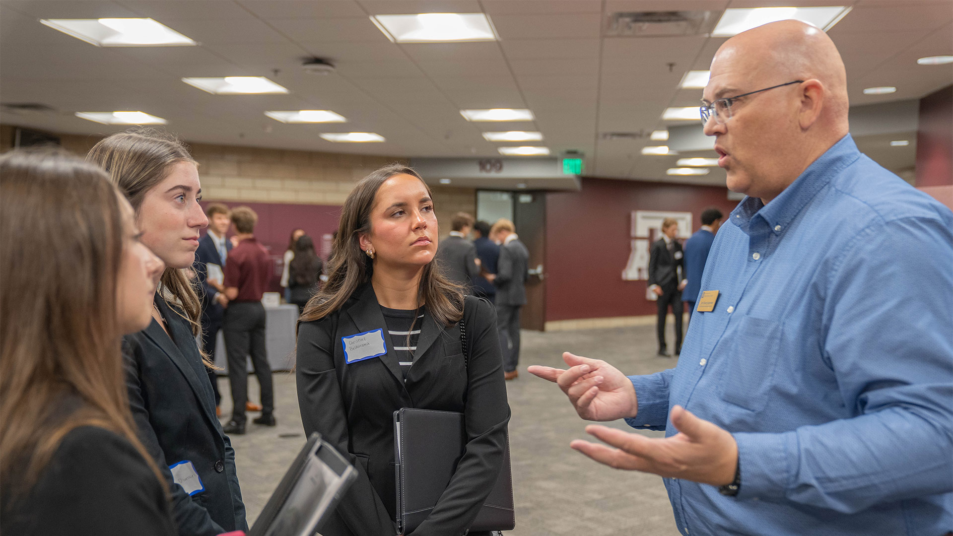Professor giving career advice to students