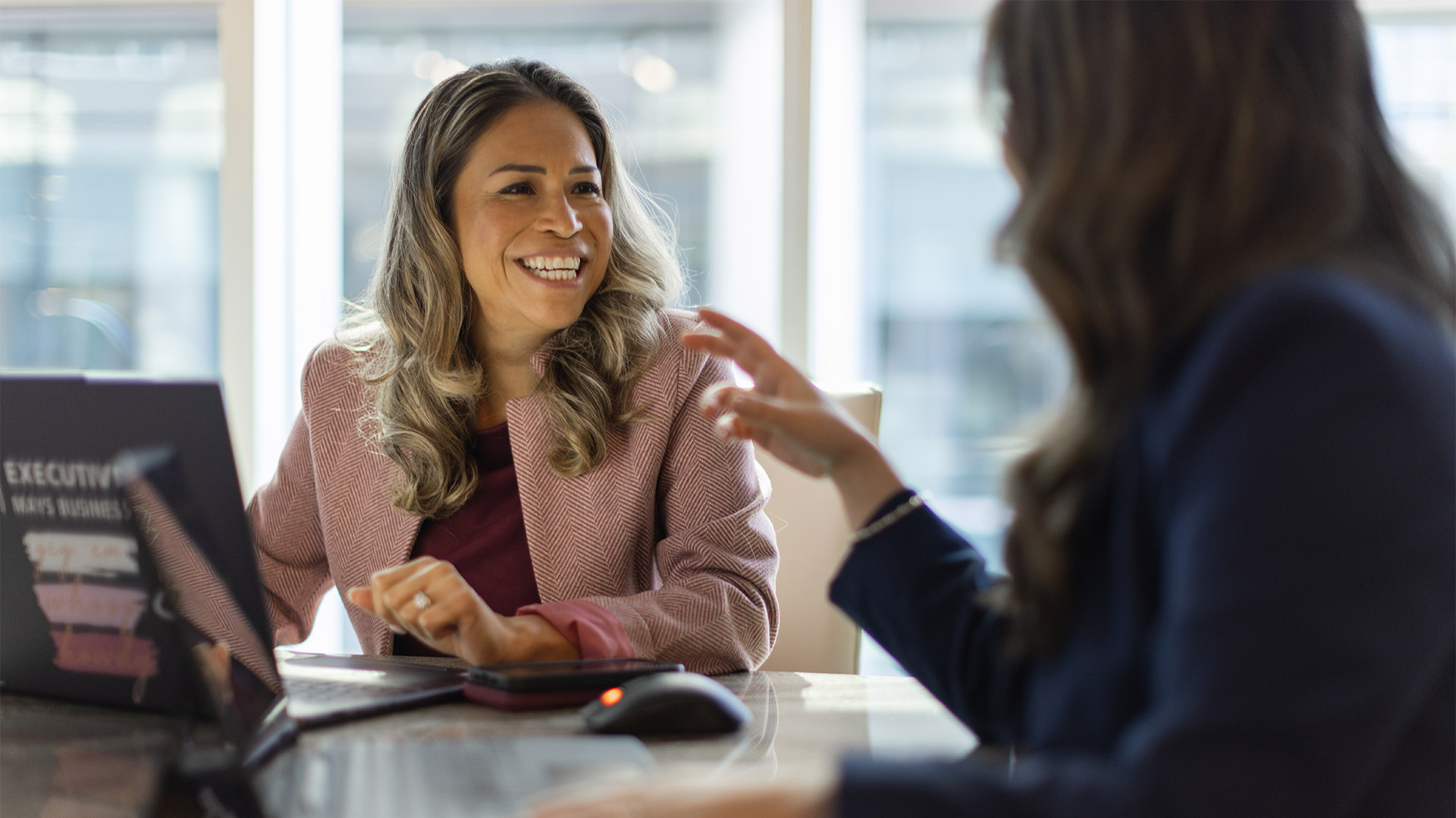 Executive MBA professionals having a conversation