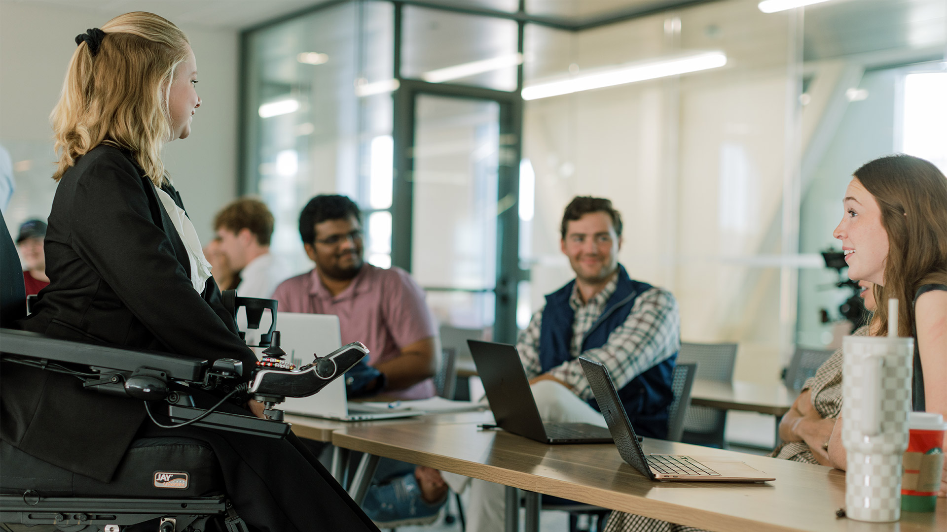 Students discussing in a meeting room