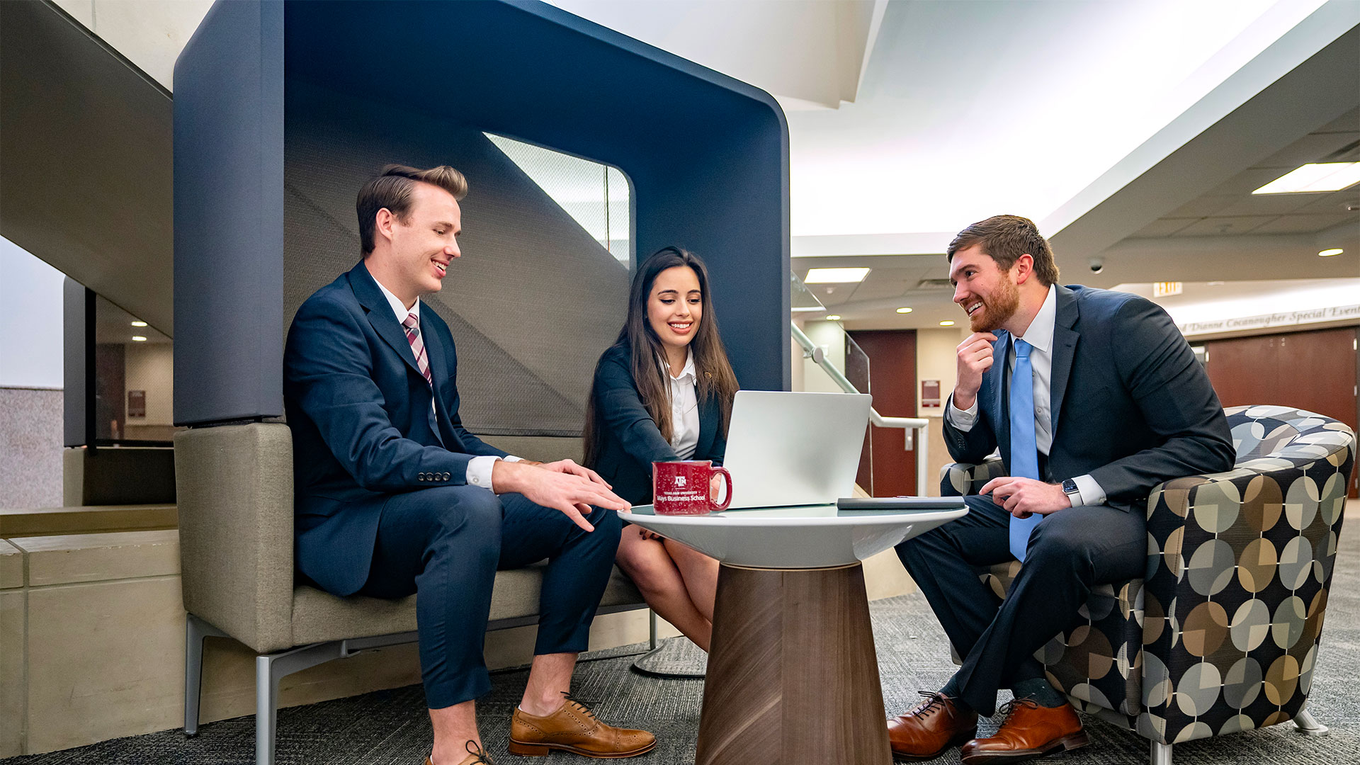 Three students having a discussion