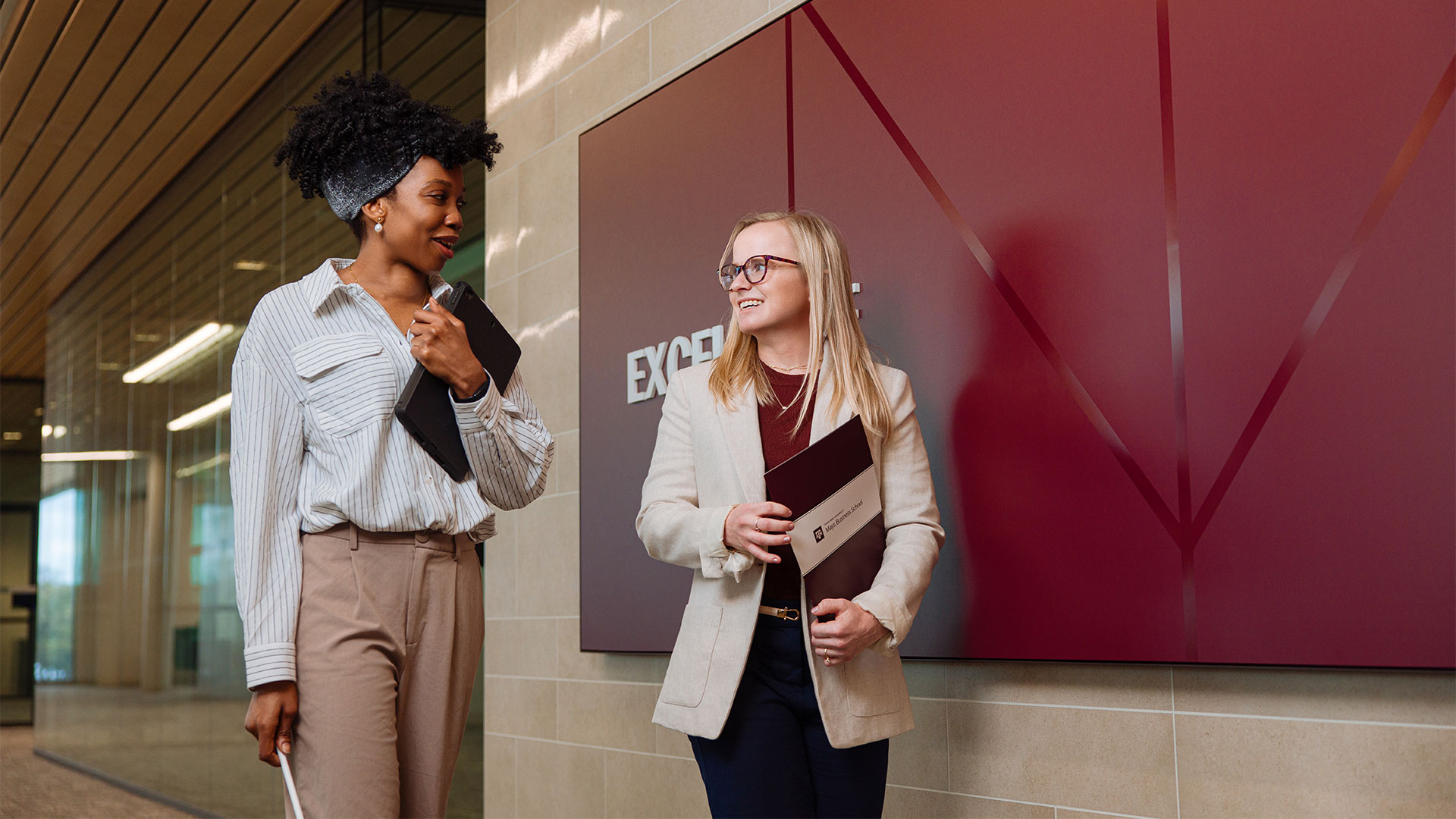 Two girls walking and talking
